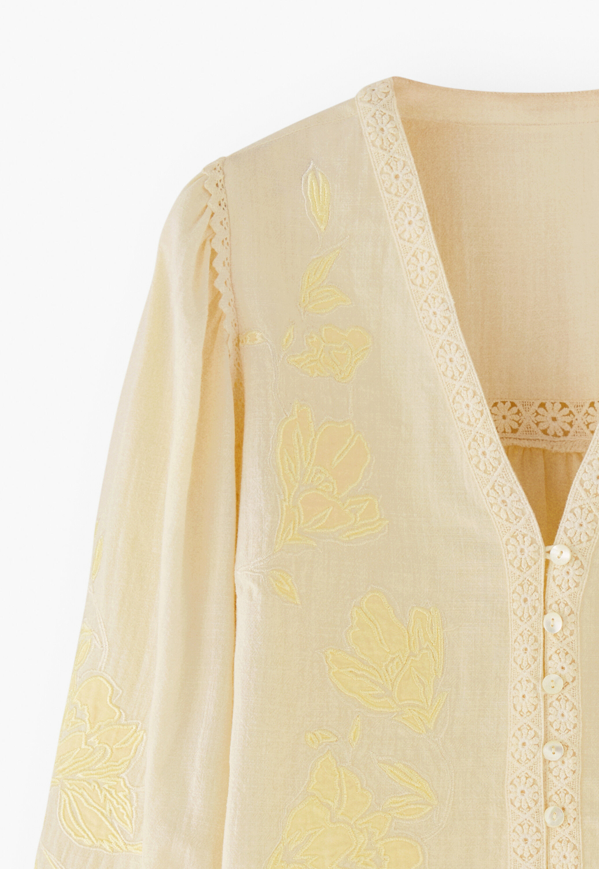Bluse mit Applikationen
